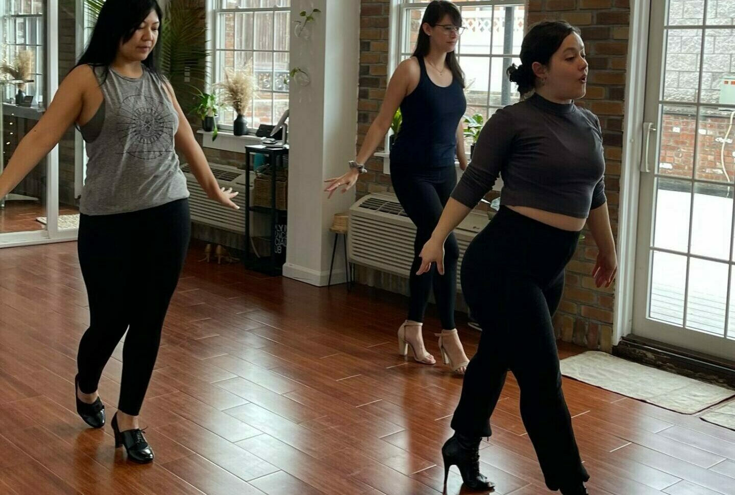 brooklyn dance lessons salsa teacher with students